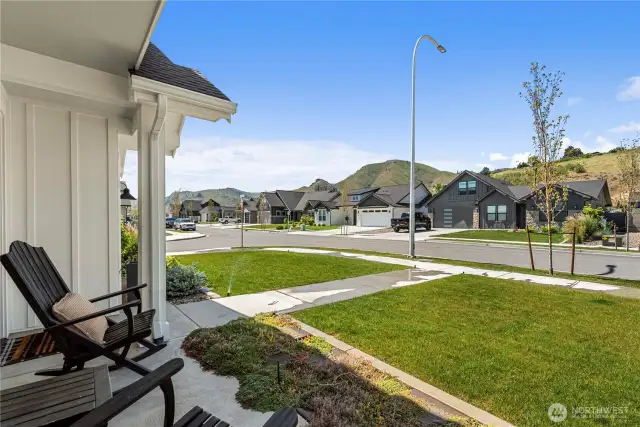 Lovely Front Porch to Watch the Worl Go By