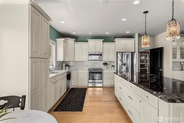 Kitchen with New to newer stainless-steel appliances.