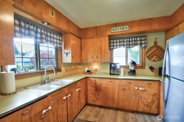Plenty of counter space and storage in kitchen.