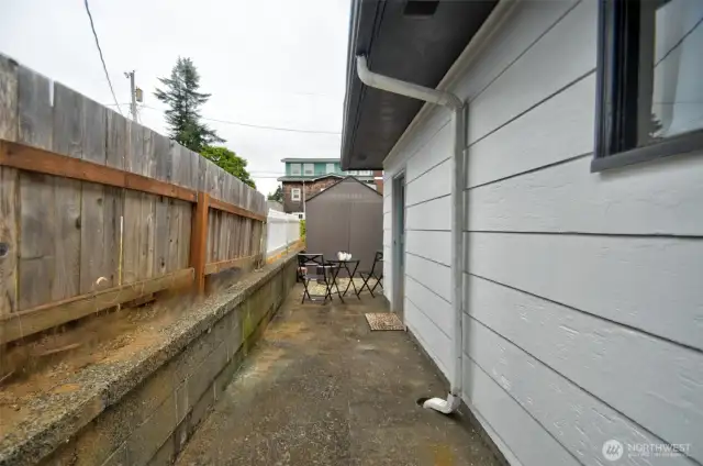 Fenced side yard.