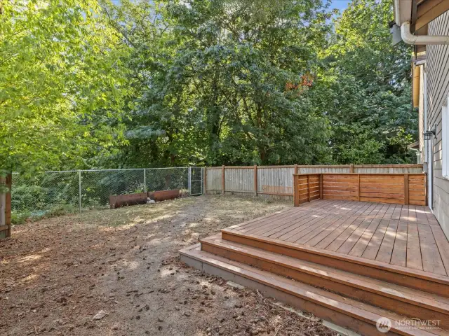 View from gate. Property goes beyond fence in back