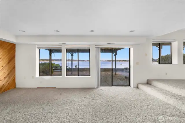 Lower level offers this huge bonus room with second space on the right that could easily convert into another bedroom. VIEWS from every level of this home!
