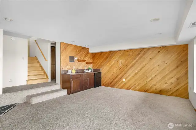 In the bonus room, looking back toward the wet-bar w/ beverage fridge.