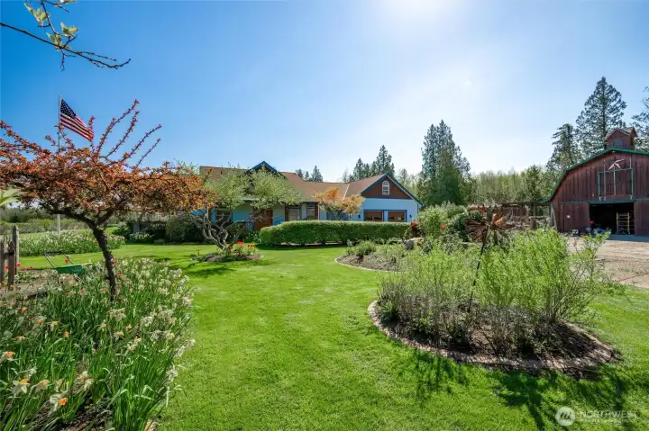 Lush gardens surrounding outdoor entertaining areas.