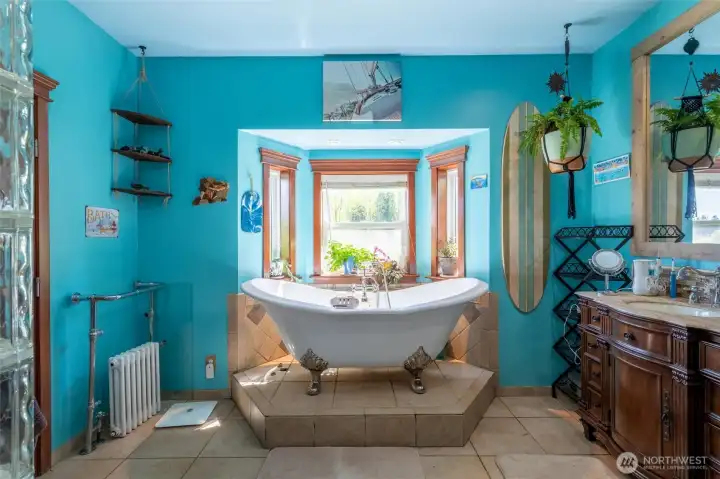 Retreat-style bath w/ soaking tub & walk-in shower.
