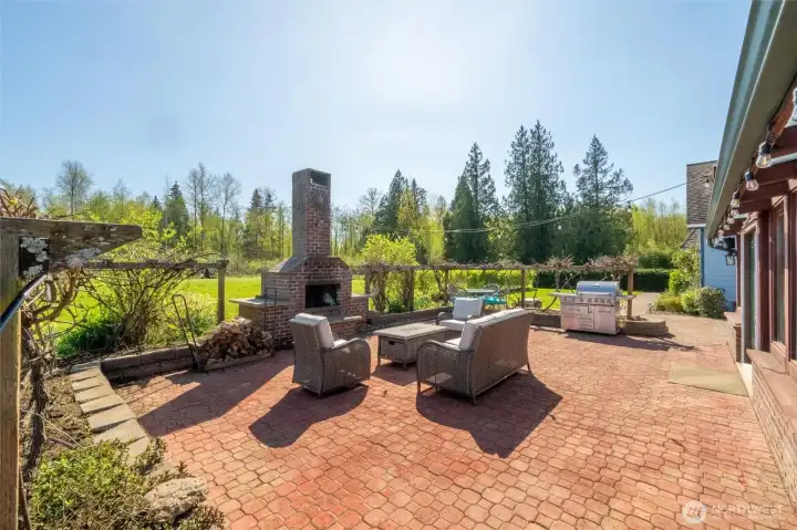 Patio with wood-burning fireplace and sweeping Mt. Baker views.