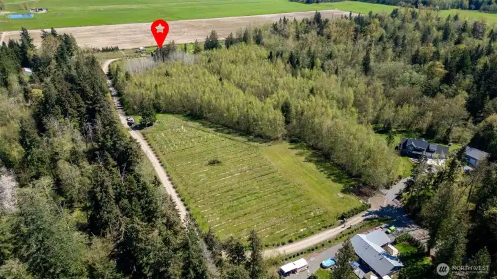 Set at the very end of a private lane with just three neighbors, the home offers unmatched peace and quiet.