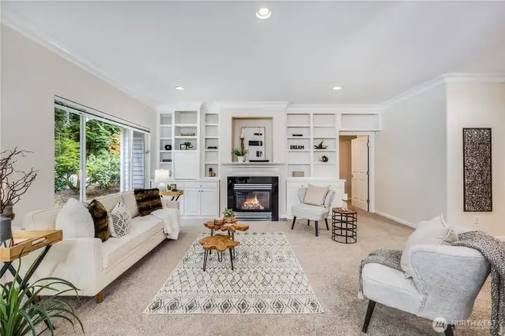 With fresh interior paint and all new carpet throughout, the home is move-in ready! Cozy up here with friends in front of the gas fireplace.