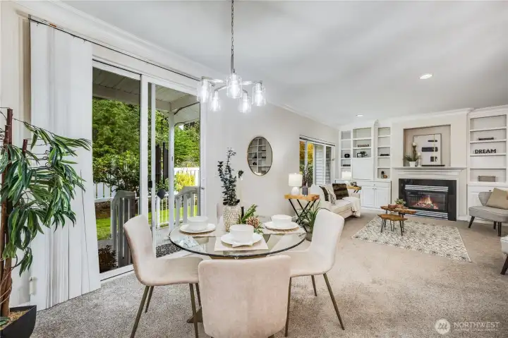 The dining area can fit a generously sized table and chairs for entertaining. Lighting it from above is a brand-new chandelier!