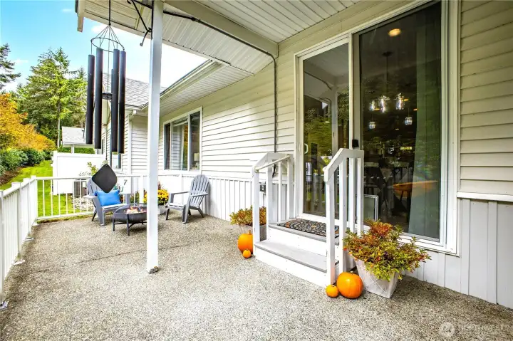 Through the dining room sliding door, you can step out to a wonderful covered patio overlooking the greenbelt.
