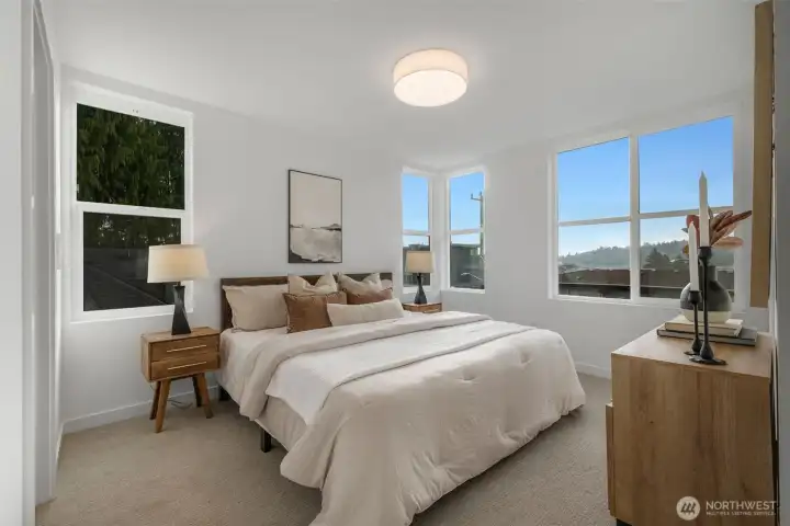 Windows offer lovely territorial view.    Photos are of model home of similar floorplan. Color scheme and layout will vary.