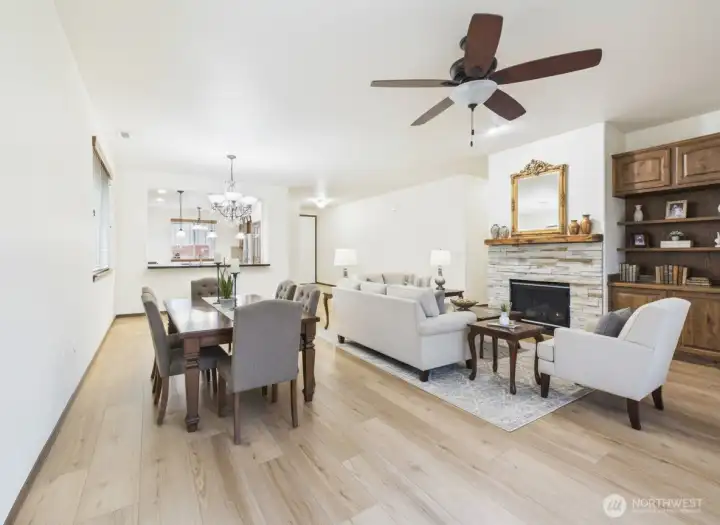 Open living and dining room areas.  Brand new luxury vinyl plank flooring installed through living areas and bedrooms.