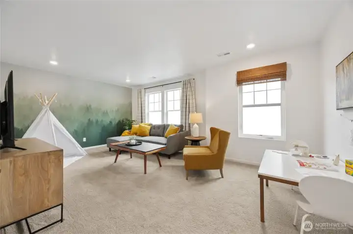 Bonus room over the garage!  Perfect for a game room, movie room, or ???  Pictures are for representational purposes only, colors and features may vary.