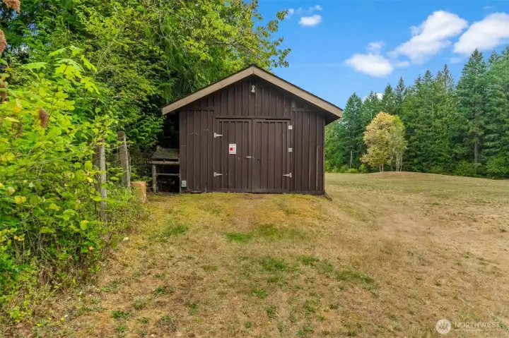 Shop constructed from trees originating on property