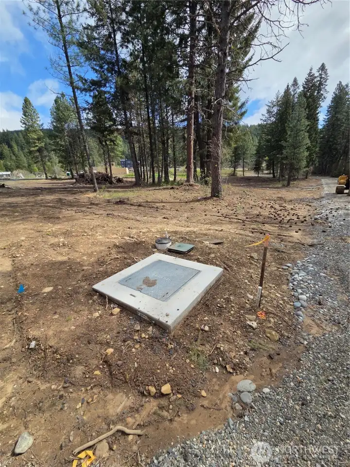 Power - water - community drain field connections in place