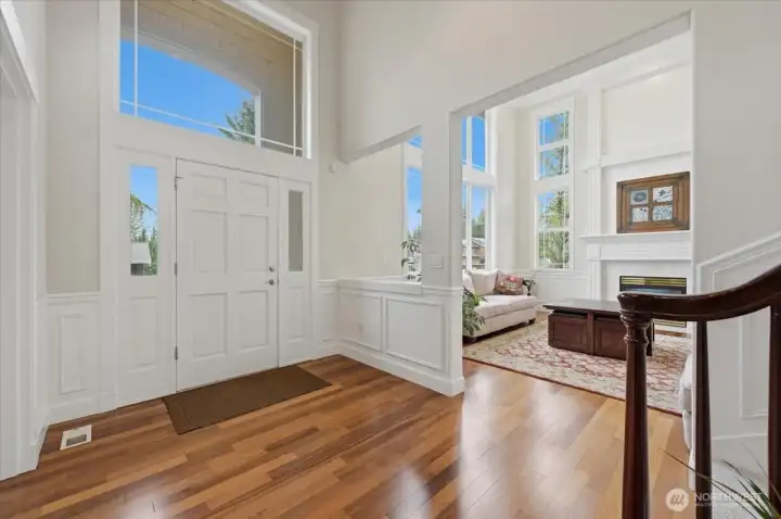 Grand entry with flowing floor plan. All Hardwood flooring on lower level with new plush carpeting upstairs