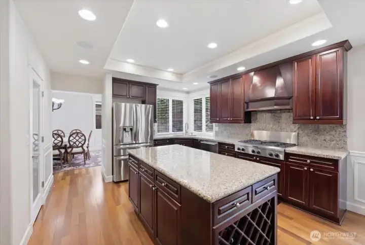 ample sized island with built in wine rack