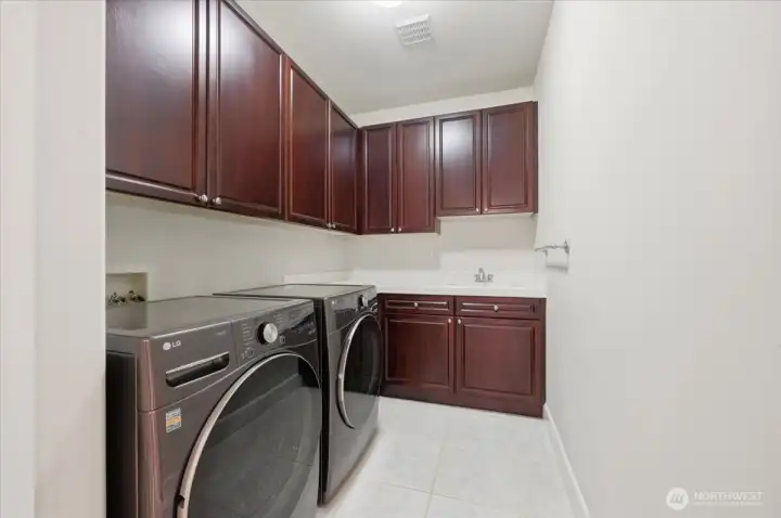 A separate laundry room that is not shared when entering the house, so much storage for your cleaning products and accessories