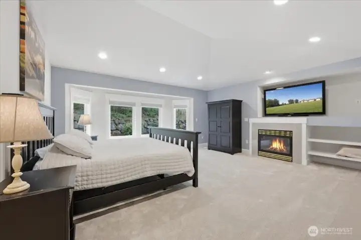 Primary Oasis, with gas fireplace buiilt in shelves. large enough to have separate sitting area