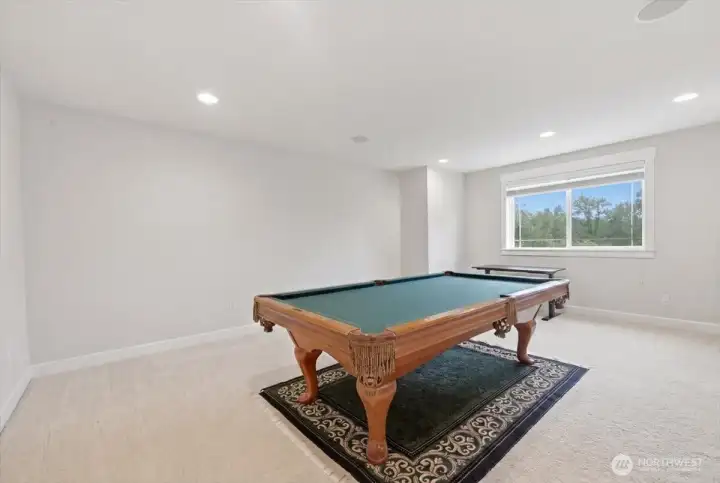 Oversized bonus room with double stair case for ease to go to the kitchen. Large enough for all gaming activities. Sellers willing to leave pool table.