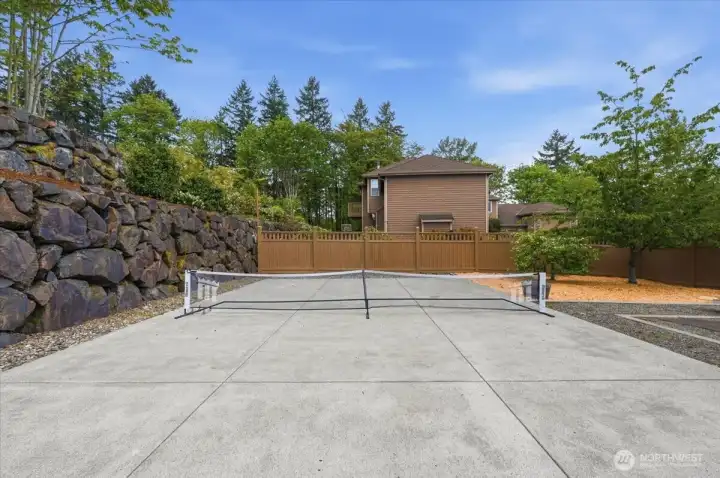 Pickle ball enthusiasts.  Practice your pickle ball game with practice court or sport court, enough room for a regulation pickleball court or have a basketball court still with enough room left over for patio area