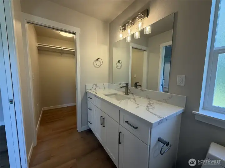 Primary Bath and walk-in-closet