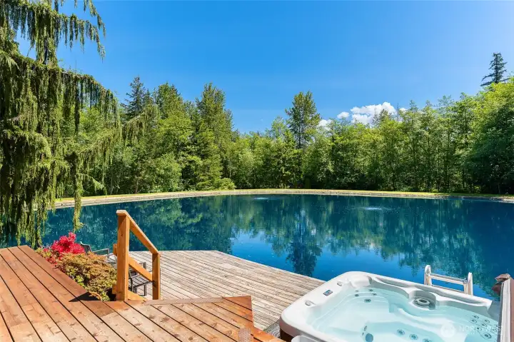 Amazing and unique feature is deck that sits on pond where you and your guest can enjoy the private waterfront living. Amazing and unique feature is deck that sits on pond where you and your guest can enjoy the private waterfront living.