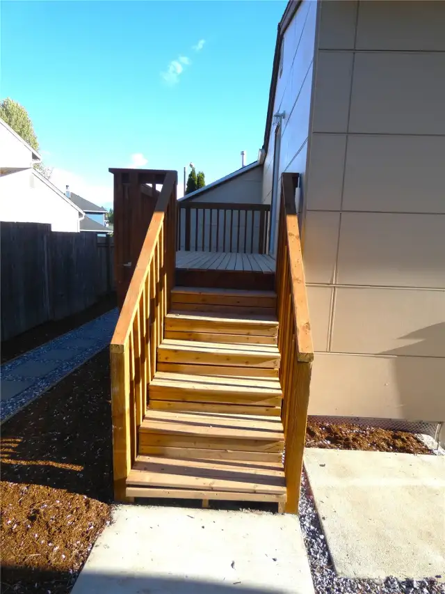 Small deck with access to back yard