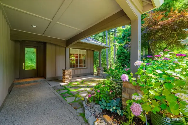 Inviting and covered front entrance to the home.