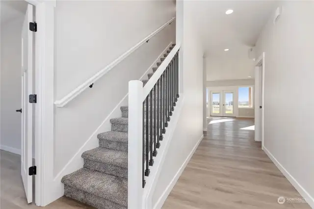 Front entry with the door to the left leading to bedroom #1 or an office.  The door to the right is a half bathroom.