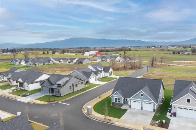 This home sits on a corner lot in a beautiful setting and neighborhood.