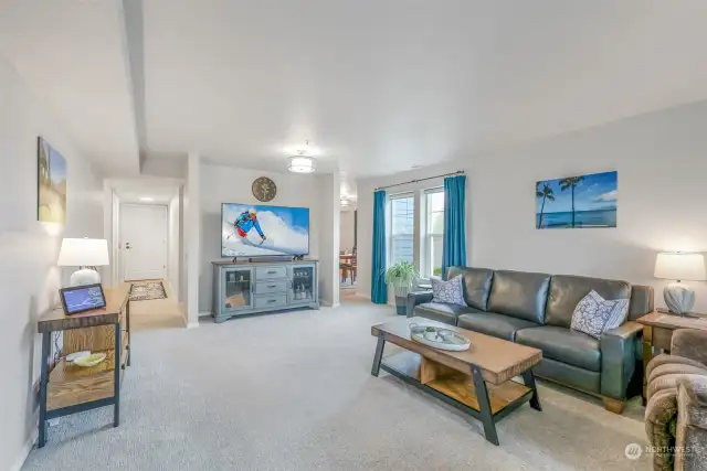 Additional view of this stunning living room space showcases remodeled living room, with balcony access, and stylish updates.