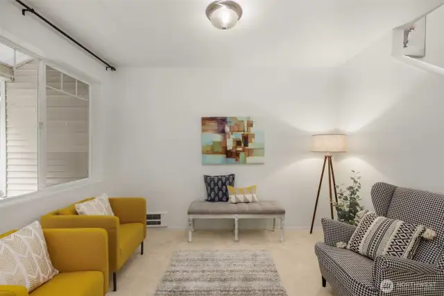 Relax on the private back deck off family room with  seclusion of the surrounding nature