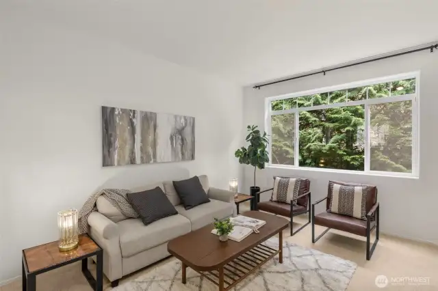 Relax on the private back deck off family room with  seclusion of the surrounding nature