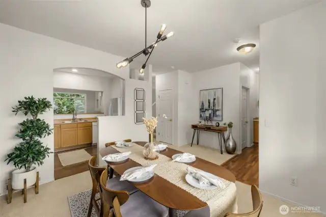 Formal dining with beautiful accent wall conveniently located next to the kitchen