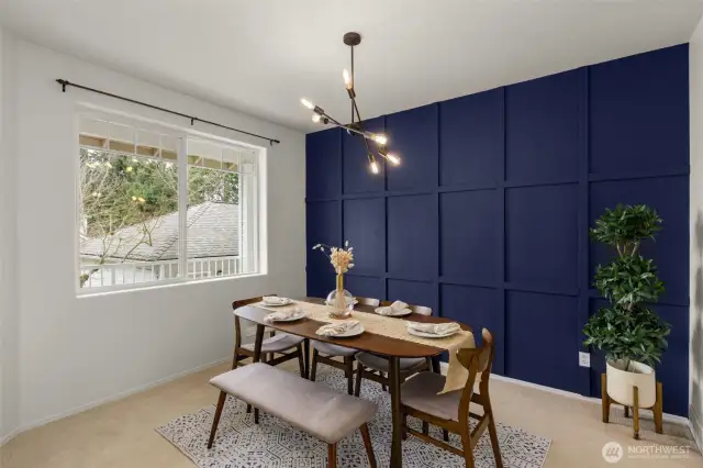 Formal dining with beautiful accent wall conveniently located next to the kitchen