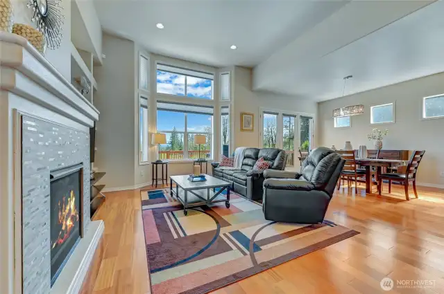 Gorgeous hardwood floors and an updated tile surround on the gas fireplace.