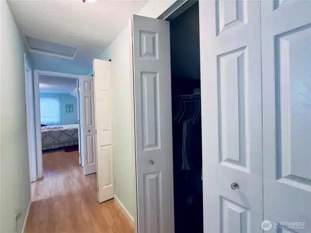 Upstairs hallway and duel walking in closets.
