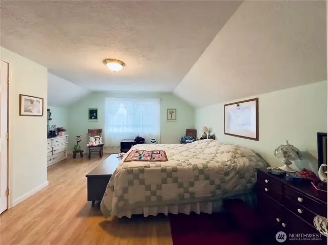 Upstairs oversize bedroom next to bathroom