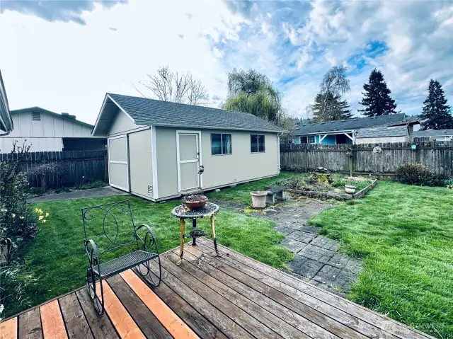 Backyard view of shed from deck