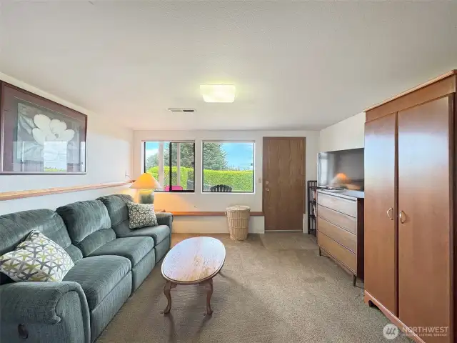 Sitting area in bedroom with access to backyard