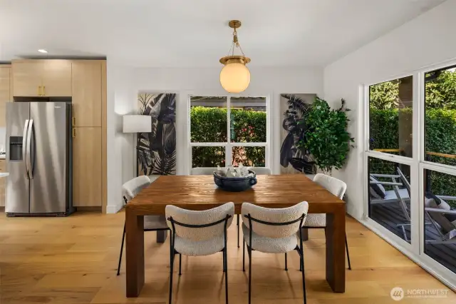 Dining Area with large airy windows.