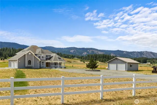 Spacious farmhouse on fenced acreage