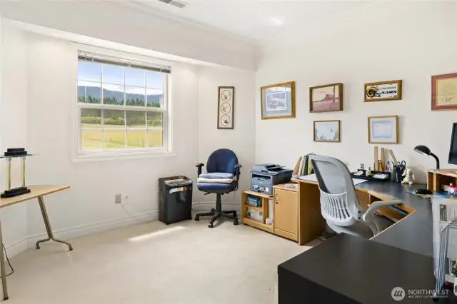 Currently used as an office, another upstairs room