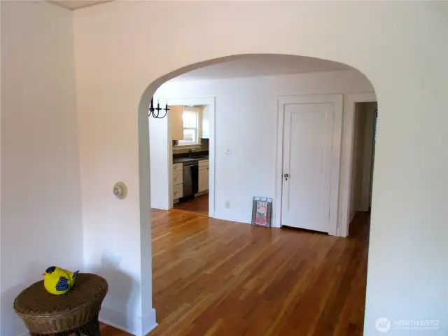Archway to Well-lit Formal Dining Room