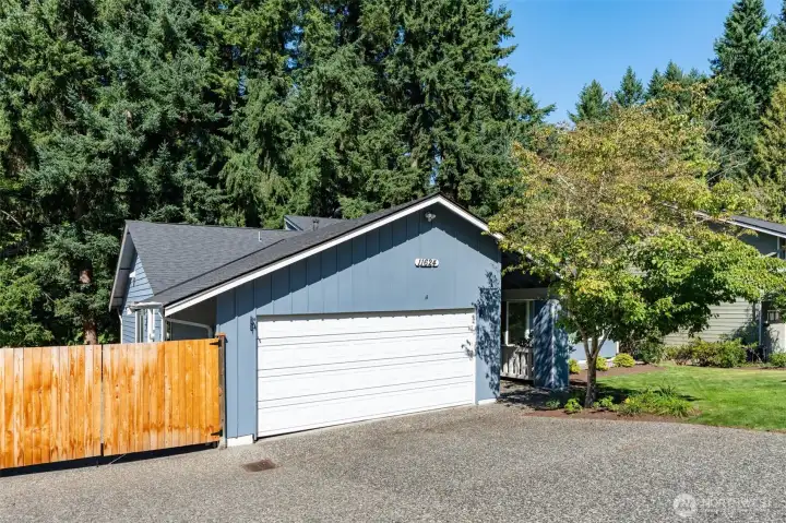 2 car garage with ample room for RV parking, as well.