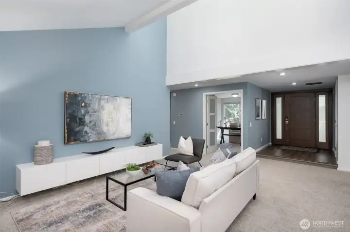 Living room has built-in cabinets for extra storage.