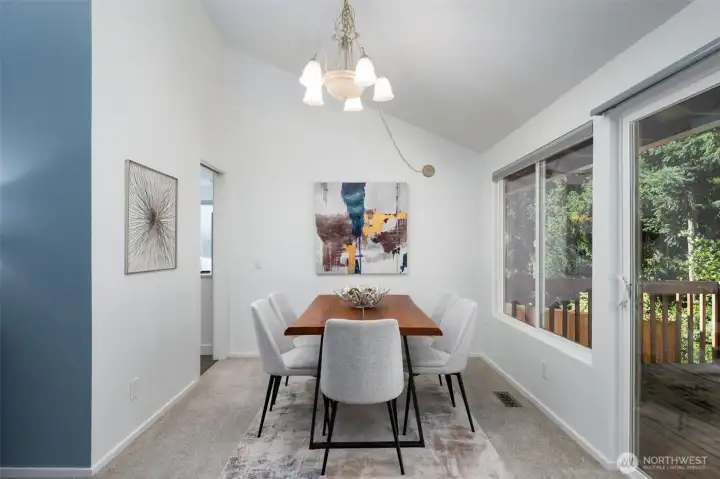 Dining room allows for easy indoor and outdoor access to the deck.