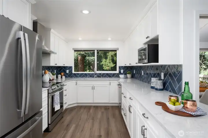 This chef's kitchen provides plenty of storage, all cabinets and drawers are soft close.