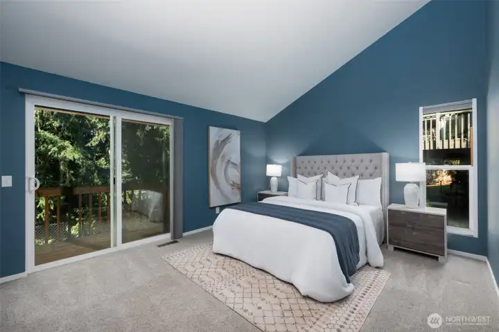 Primary bedroom with your own outdoor oasis, this private deck is just the place for that morning coffee.